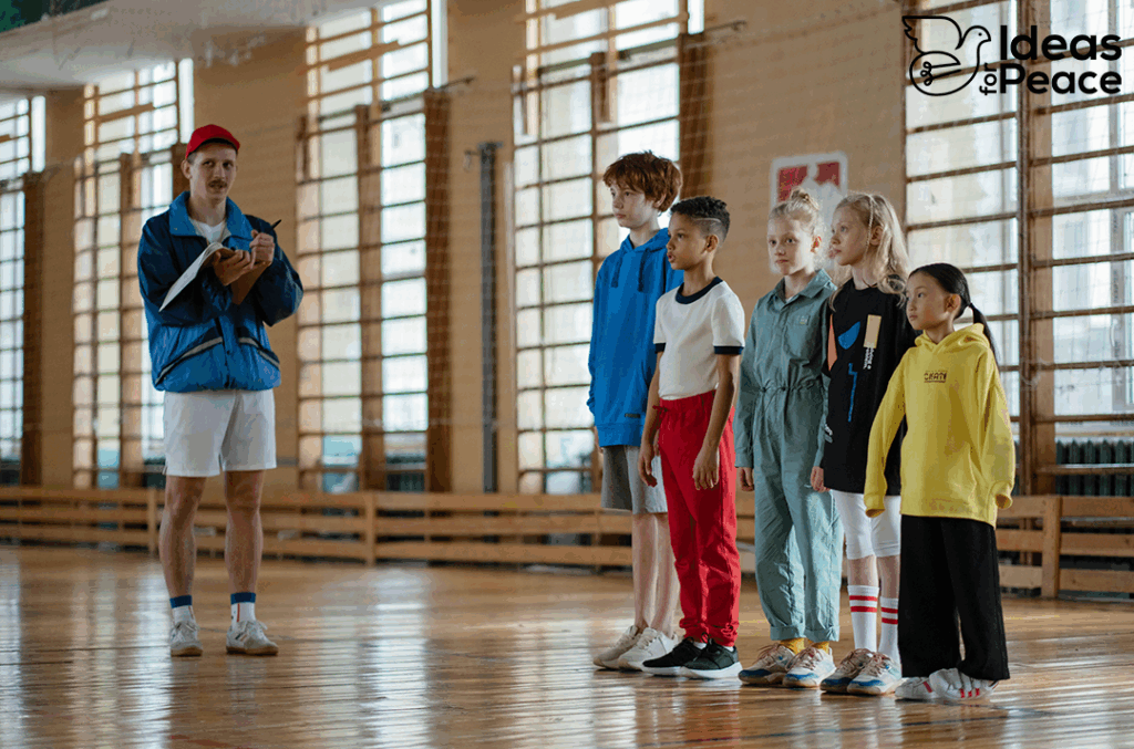 kids in gym clothes with a professor