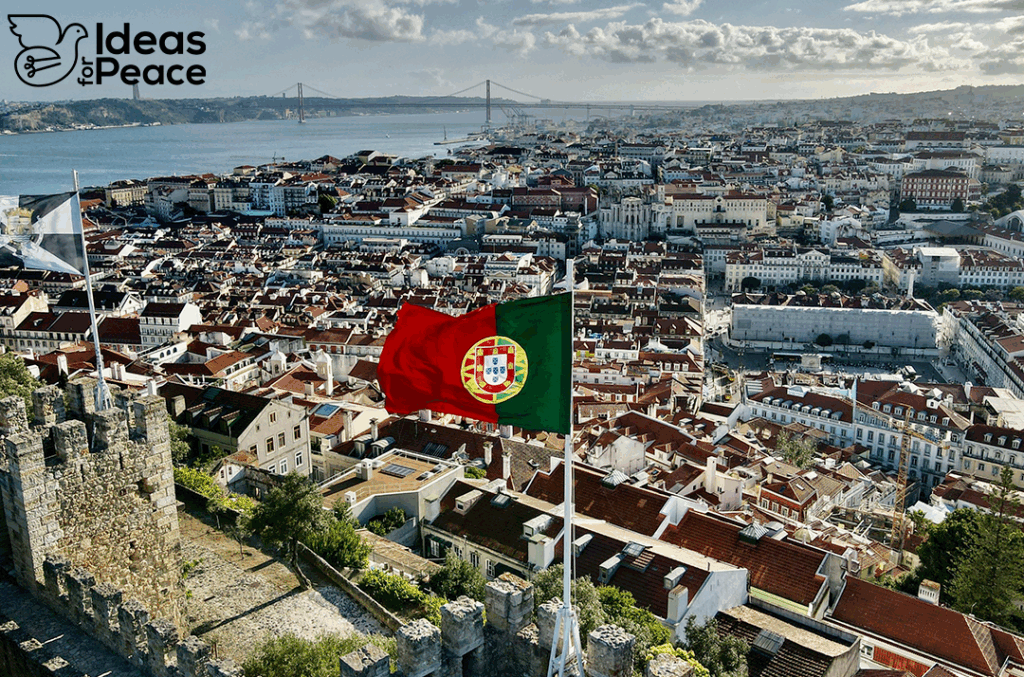 Portugal's flag with the view of a city